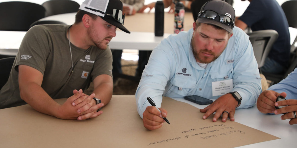 Farmers collaborating at workshop