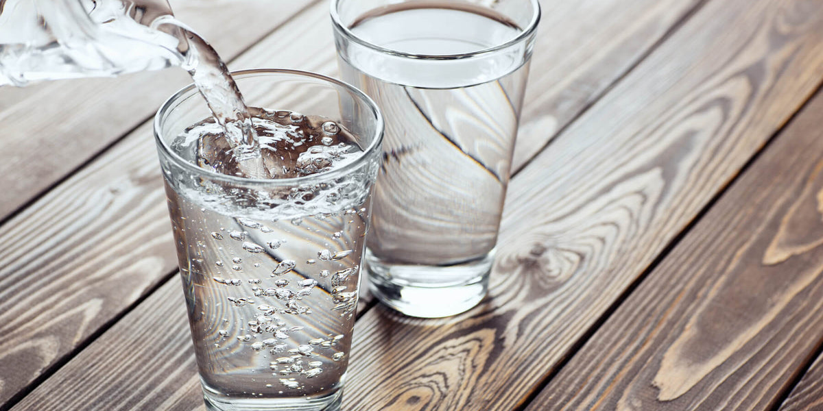 Water being poured into glasses